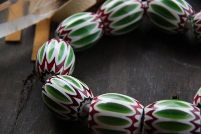 Green, Red, White African Chevron Bead, 30x35mm - ShopWomanShopsWorld.com. Bone Beads, Tassels, Pom Poms, African Beads.