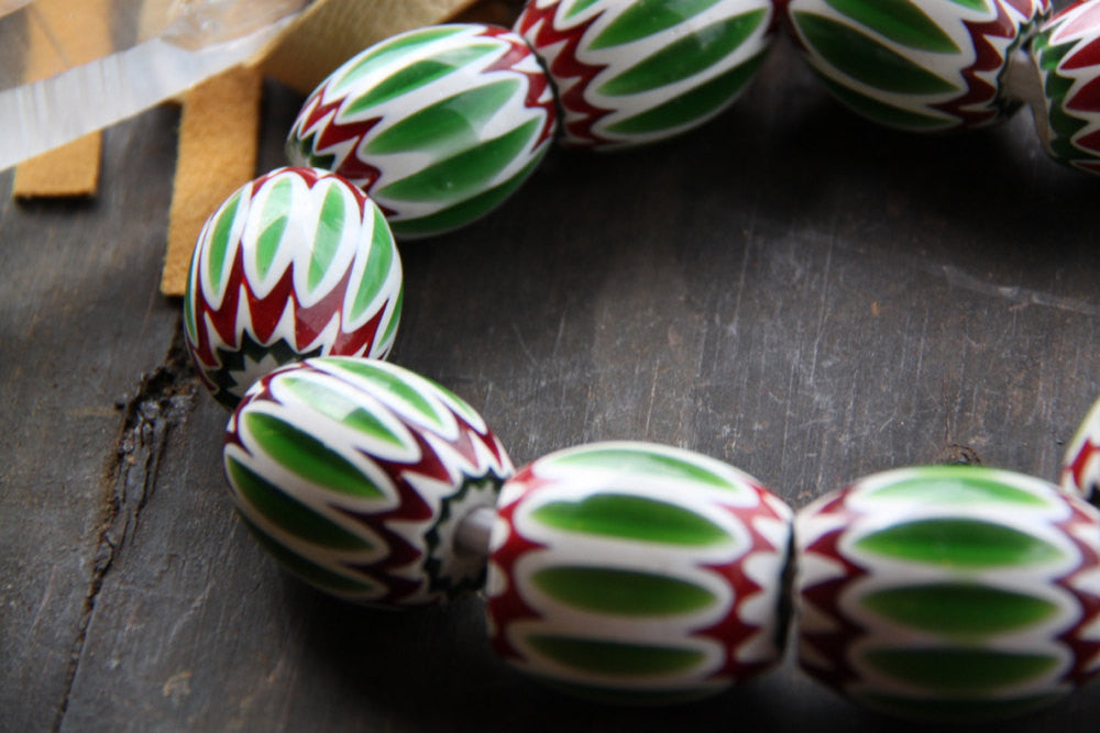 Green, Red, White African Chevron Bead, 30x35mm - ShopWomanShopsWorld.com. Bone Beads, Tassels, Pom Poms, African Beads.