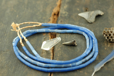 Periwinkle Blue Glass Tube African Beads, 4x12mm, 25" strand - ShopWomanShopsWorld.com. Bone Beads, Tassels, Pom Poms, African Beads.