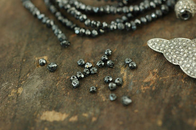 A Girls' Best Friend: Natural Black Diamond Beads, 2x1.5mm, 15 Pieces - ShopWomanShopsWorld.com. Bone Beads, Tassels, Pom Poms, African Beads.