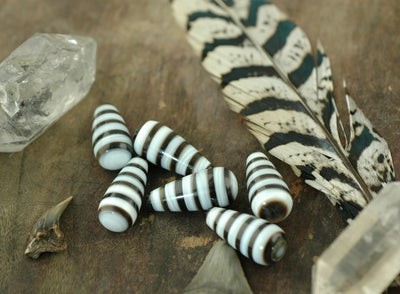 Striped Tears: 10x23mm Black and White Teardrop Pendant, 1 piece - ShopWomanShopsWorld.com. Bone Beads, Tassels, Pom Poms, African Beads.