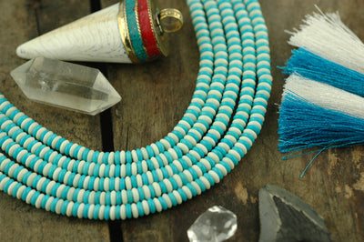 Minty Fresh: Aqua, White Bone Beads, 5x2mm, 18" strand - ShopWomanShopsWorld.com. Bone Beads, Tassels, Pom Poms, African Beads.