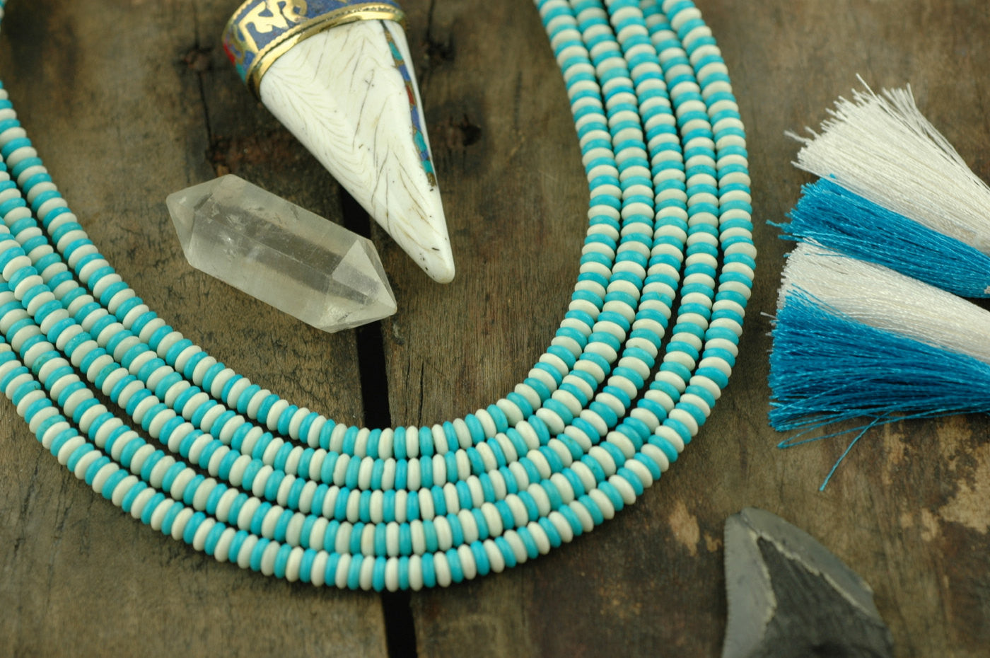 Minty Fresh: Aqua, White Bone Beads, 5x2mm, 18" strand - ShopWomanShopsWorld.com. Bone Beads, Tassels, Pom Poms, African Beads.