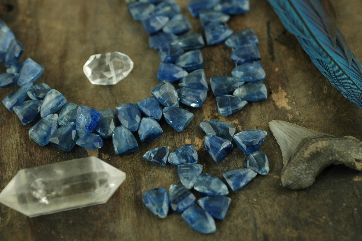Kyanite Trillion : Brilliant Sparkling Blue Faceted Teardrop Beads / 9x12mm, 4 Beads / Designer Quality NaturalJewelry Making Supplies - ShopWomanShopsWorld.com. Bone Beads, Tassels, Pom Poms, African Beads.