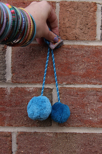 Blue Pom Pom Swag, 2" Pom, 1.5" Pom - ShopWomanShopsWorld.com. Bone Beads, Tassels, Pom Poms, African Beads.