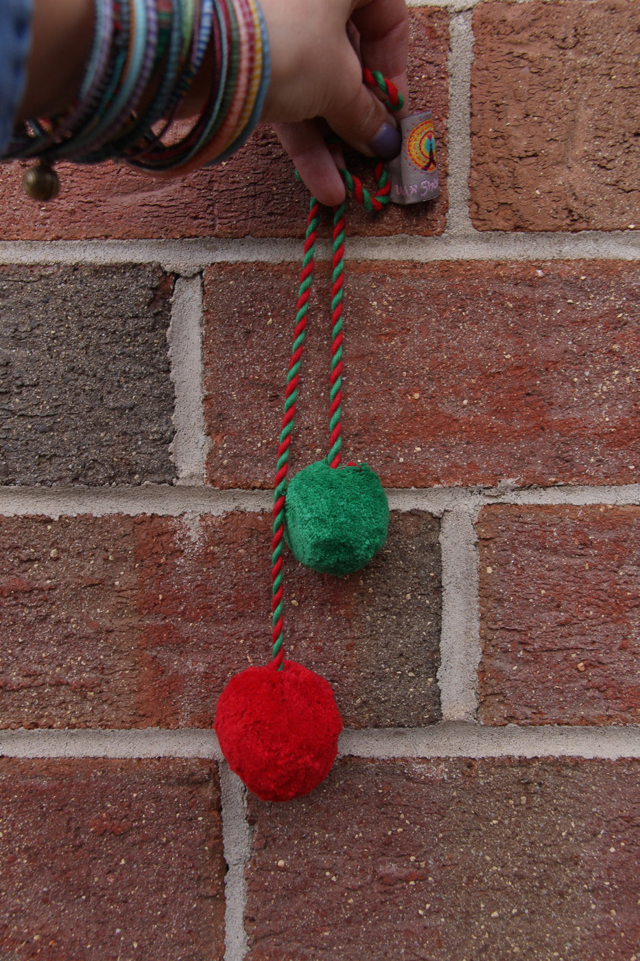 Red, Green Pom Pom Swag: Rich Festive Holiday Swag, 2" Pom, 1.5" Pom - ShopWomanShopsWorld.com. Bone Beads, Tassels, Pom Poms, African Beads.