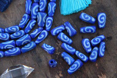 Cobalt Teardrop Bone Beads: Spiral Design, 6x12mm, 16 pieces - ShopWomanShopsWorld.com. Bone Beads, Tassels, Pom Poms, African Beads.