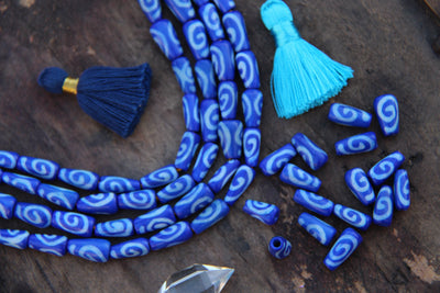 Cobalt Teardrop Bone Beads: Spiral Design, 6x12mm, 16 pieces - ShopWomanShopsWorld.com. Bone Beads, Tassels, Pom Poms, African Beads.