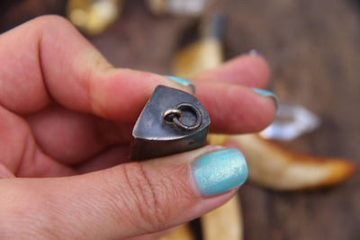 In the Spirit: 4" Natural Tusk & Brass Pendant, 1 piece - ShopWomanShopsWorld.com. Bone Beads, Tassels, Pom Poms, African Beads.