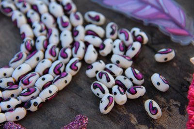Hand Painted Pink Comma Barrel Beads, 5x8mm, 23 pieces - ShopWomanShopsWorld.com. Bone Beads, Tassels, Pom Poms, African Beads.