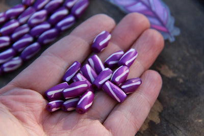 Purple Slant: Hand Painted Barrel Bone Beads, 7x13mm, 16 pieces - ShopWomanShopsWorld.com. Bone Beads, Tassels, Pom Poms, African Beads.