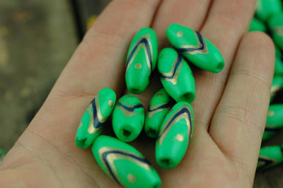 Green Barrel: Green, Gold & Black Chevron Bone Beads, 10x25mm, 8 pieces - ShopWomanShopsWorld.com. Bone Beads, Tassels, Pom Poms, African Beads.