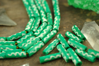 Green Wavy Tube: Handmade Bone Beads, 4x19mm, 11 pieces - ShopWomanShopsWorld.com. Bone Beads, Tassels, Pom Poms, African Beads.