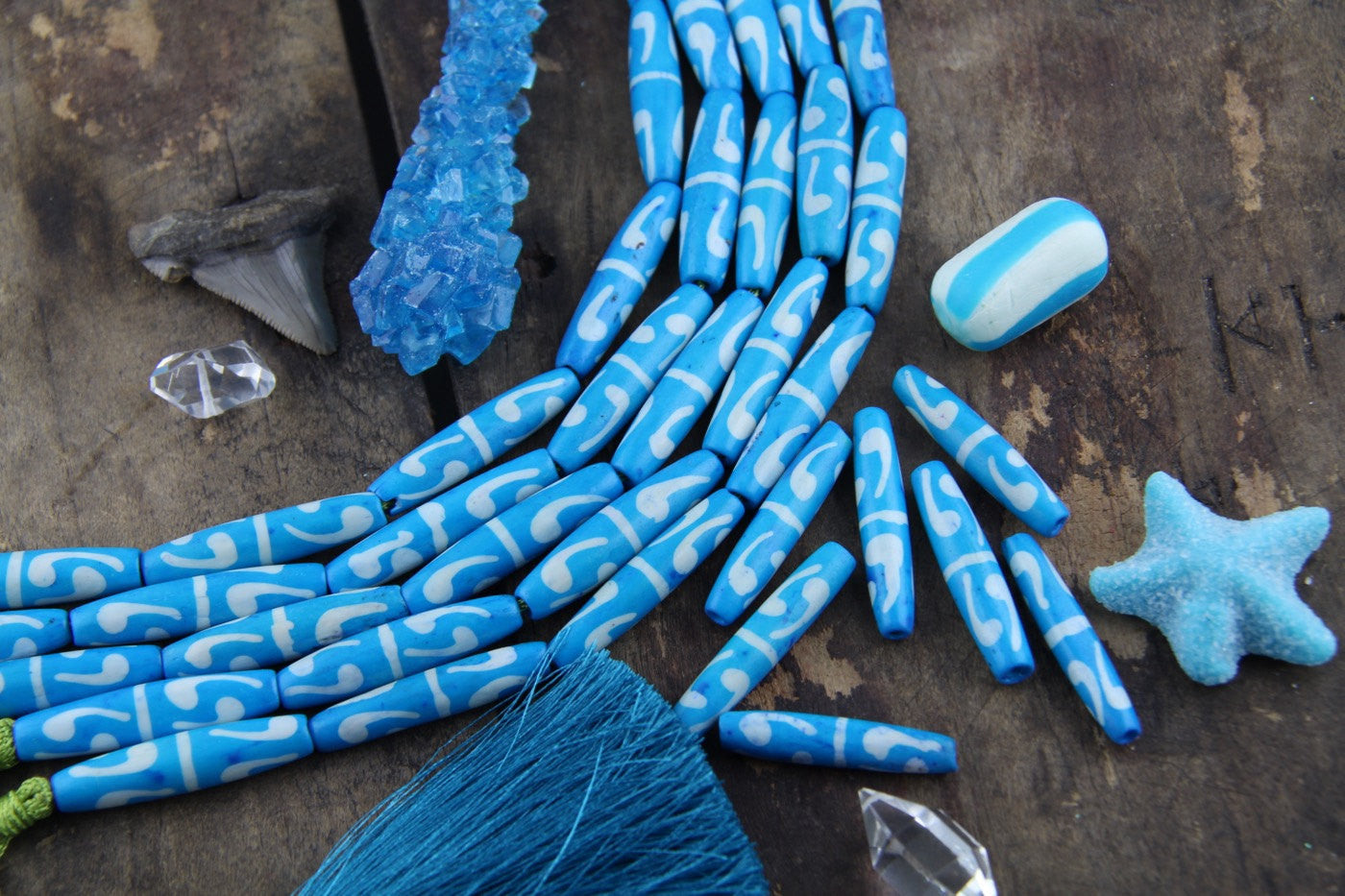 Double Comma Tube: Aqua Hand Painted Bone Beads, 7x36mm, 6 pieces - ShopWomanShopsWorld.com. Bone Beads, Tassels, Pom Poms, African Beads.