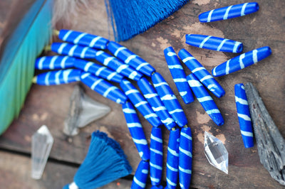 Diagonal Striped Tube: Royal Blue Bone Beads, 8x35mm, 6 pieces - ShopWomanShopsWorld.com. Bone Beads, Tassels, Pom Poms, African Beads.