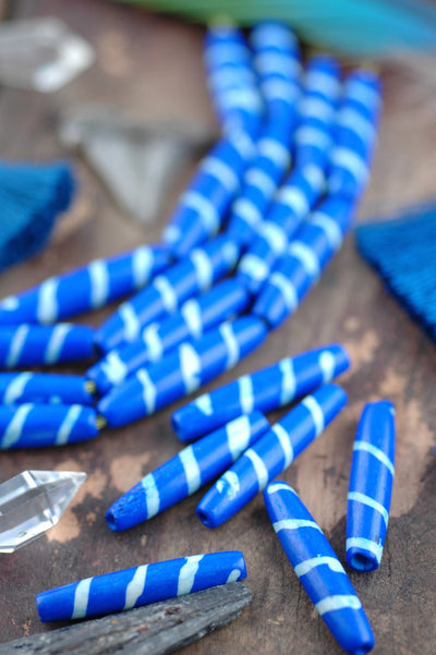 Diagonal Striped Tube: Royal Blue Bone Beads, 8x35mm, 6 pieces - ShopWomanShopsWorld.com. Bone Beads, Tassels, Pom Poms, African Beads.