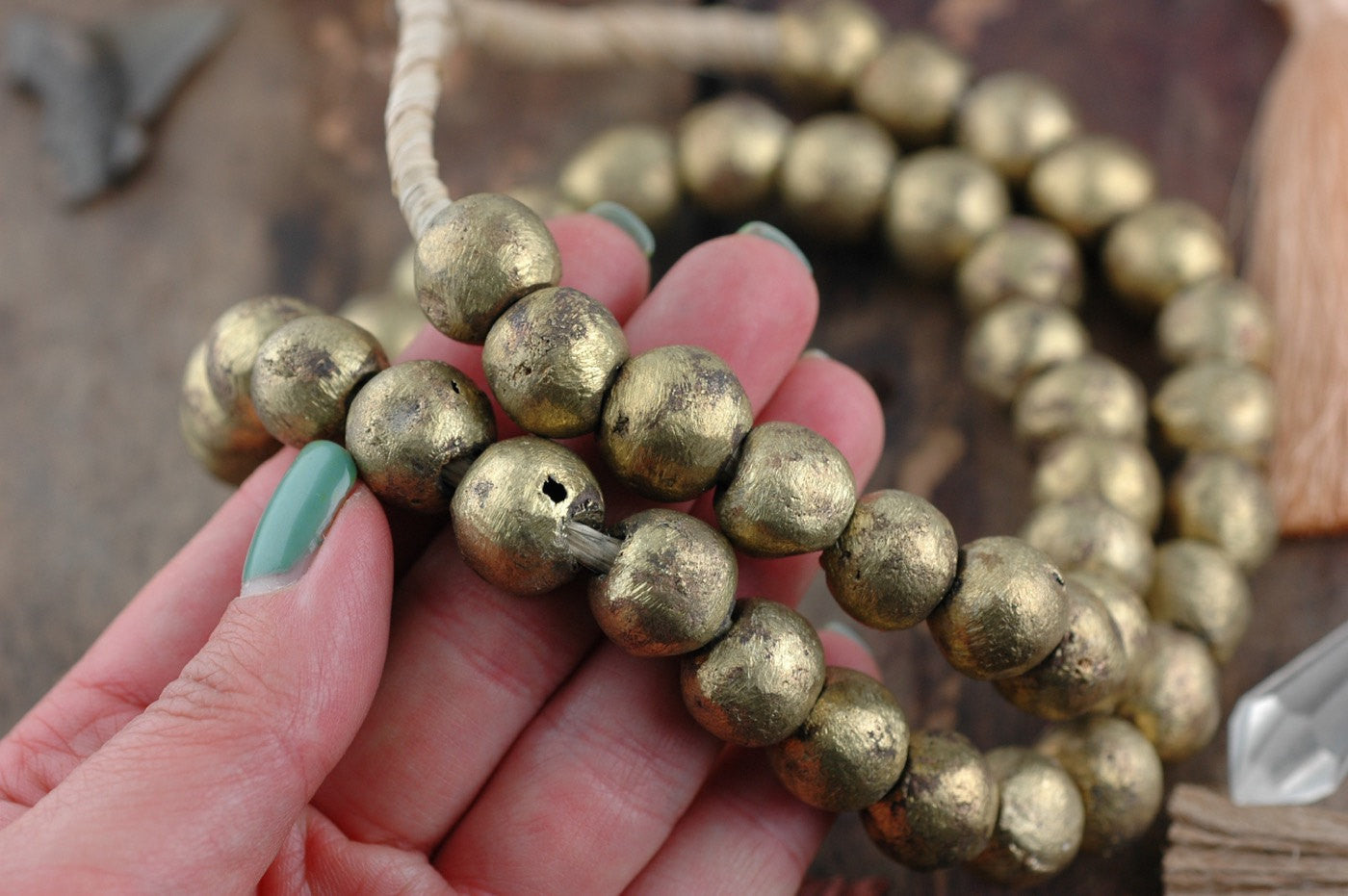 Orbiting: Round Brass African Beads, from Cameroon, 15-16mm, Authentic Tribal Jewelry, Golden Metallic Large Beads, Jewelry Making Supply - ShopWomanShopsWorld.com. Bone Beads, Tassels, Pom Poms, African Beads.