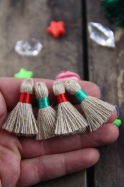 Christmas Mini Jute Tassels, 1.25" with Red & Green Binding, 4 pieces - ShopWomanShopsWorld.com. Bone Beads, Tassels, Pom Poms, African Beads.