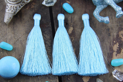 Limpet Shell Pastel Blue Silky Jewelry Tassels, 2 Pieces - ShopWomanShopsWorld.com. Bone Beads, Tassels, Pom Poms, African Beads.