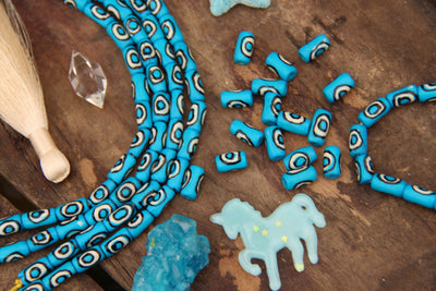 Turquoise Bullseye Tube: Aqua Blue Black White Bone Beads, 7x13mm, 16 pieces - ShopWomanShopsWorld.com. Bone Beads, Tassels, Pom Poms, African Beads.