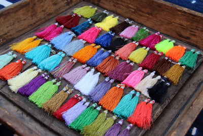 Silk Tassels, Art Silk from India, 2", 30 pieces - ShopWomanShopsWorld.com. Bone Beads, Tassels, Pom Poms, African Beads.